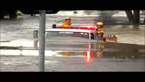 Fire Truck Drives Through Water