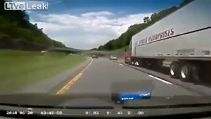 Truck Cuts Car On The Highway