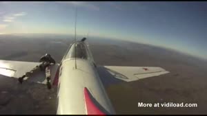 Daredevil Rides Plane Wing