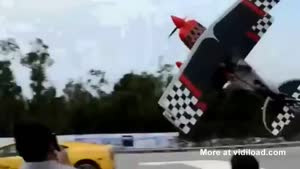 Stunt Plane Flies Right Next To A Lamborghini