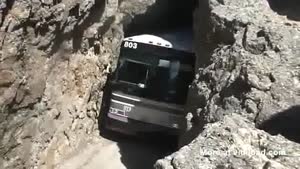Bus Goes Through Incredibly Narrow Passage