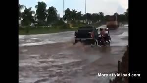 Moped Driver Obviously Never Heard Of Potholes Before