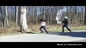 Guy Chasing Girl With A Bucket Of Water