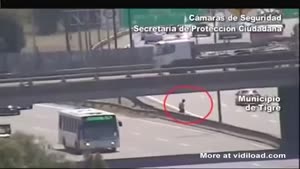 Crazy Guy Crosses Busy Highway