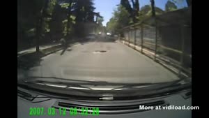 Car Crashes By Driving Over A Utility Hole