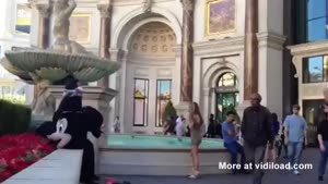 Hot Girl Strikes A Pose On A Fountain