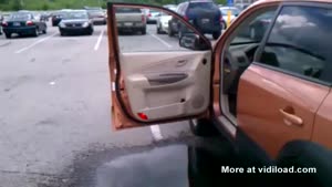 Girl Tries To Save Her Shoes From A Puddle