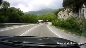 Truck Slides Into Car