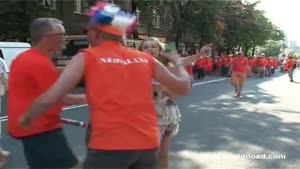 Cute Reporter Videobombed By Dutch Soccer Fans