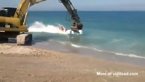 Excavator Fun On The Beach