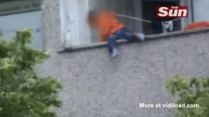 Toddler Playing On The Edge Of A Balcony