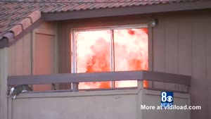 Cat Trapped On Balcony Of Burning House
