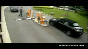 Chick Knocked Out By Closing Boom Gate