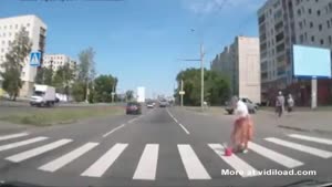 Couple Tries To Help Elderly Lady Cross The Street