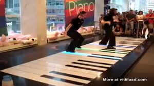 Girls Play Giant Piano