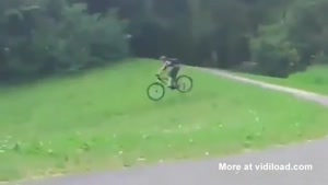 Kid On Bike Meets Picnic Table