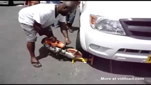 Man saws off car boot in front of police officers