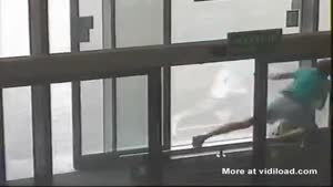 Drunk Man Gets Knocked Over By Sliding Door