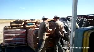 Guy Bets He Can Lift A Bag Of Cement Over His Head