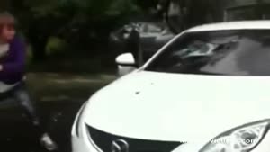 Dude Destroys Girlfriends Car With A Bat