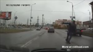 Dumb Guy Almost Gets Hit By Car