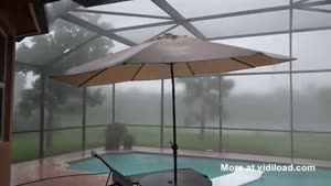 Woman Gets Surprised While Filming Storm