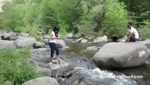 Girl Fails At Jumping Creek