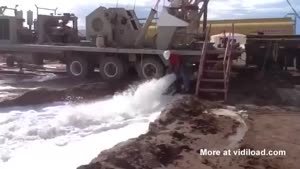 Worker Messing Around With Pipe