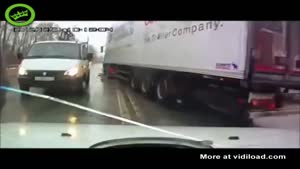 Car Gets Sandwiched By Trucks