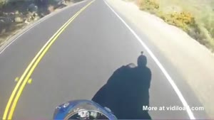 Motorcyclist Falls After Crashing
