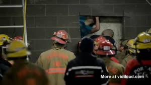 Woman Stuck In Between Buildings