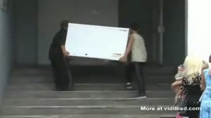 Drunks Carrying A Freezer
