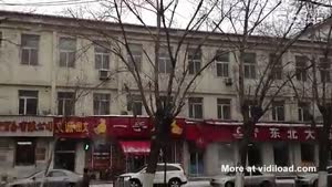 Melting Snow Slides Off Roof