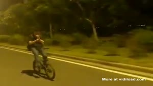 Cycling Backwards And Texting