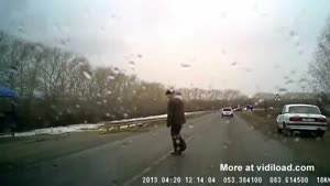 Truck Doesn't Notice Old Man Crossing