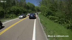 Motorcyclist Escapes Crash