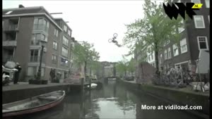 BMX'er Jumps Canal In Amsterdam