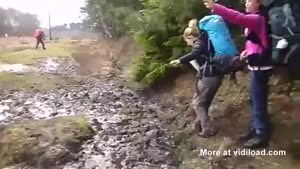 Girl Jumps Creek