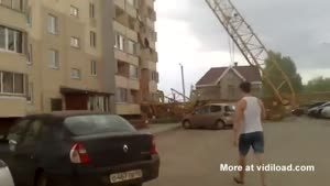 Crane Falls Through Building