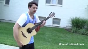 Casually Playing Guitar While Making A Shot