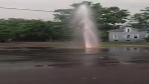 Heavy Rain Turns Pothole Into Geyser