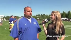 Female Reporter On The Football Field