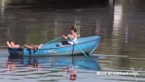 Couple On Relaxed Romantic Boat Ride