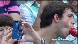 Baseball Fan Enjoying Beer Too Much
