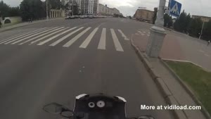 Biker Dodges Car Just In Time