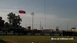 Skydiver Lands On Baseball Field