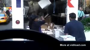 Female FedEx Deliverer Throws Packages