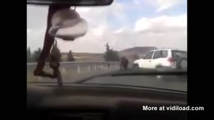 Raging Bull Attacks Car On Highway
