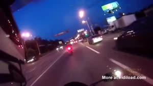 Car Takes Revenge At Motorcyclist