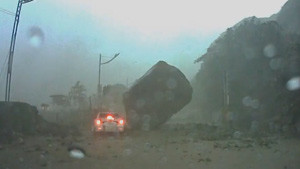 Giant Rock Almost Crushes Car